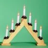 Premier® 7 Light Flickering Wooden Arch Candelabra 1 Premier® 7 Light Flickering Wooden Arch Candelabra -Philips Shop l l i li98031